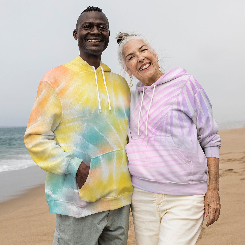 Tie dye hoodie couple on beach photo