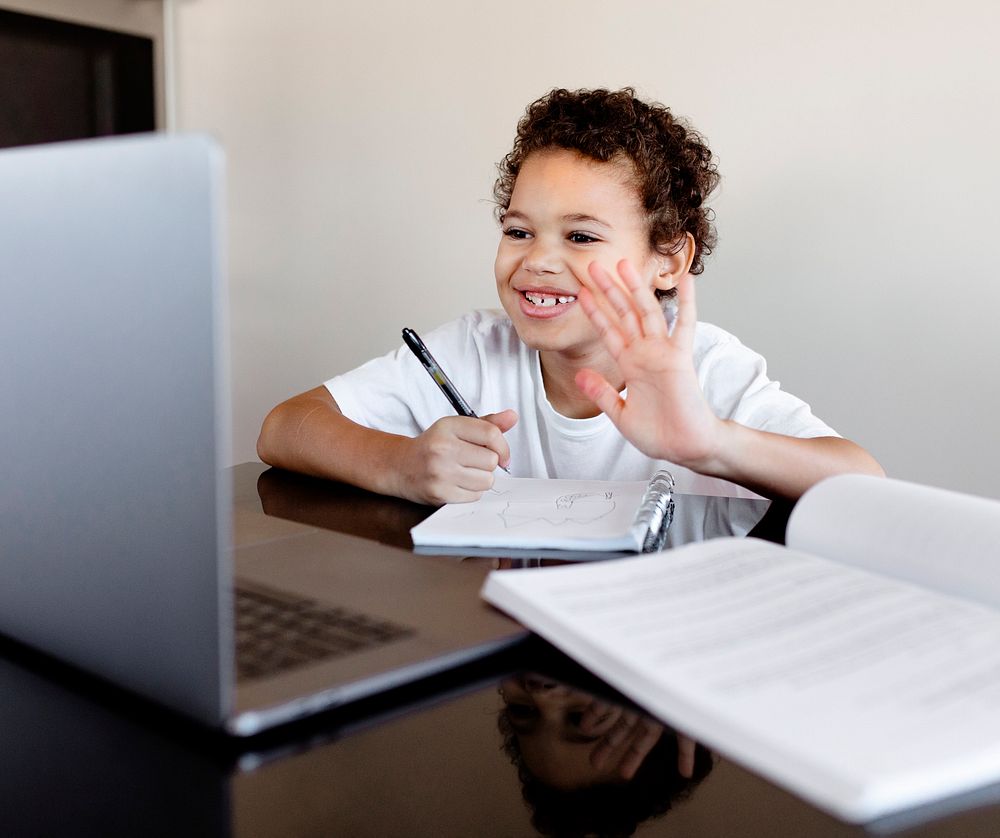 Boy studying in an online classroom through an e-learning course