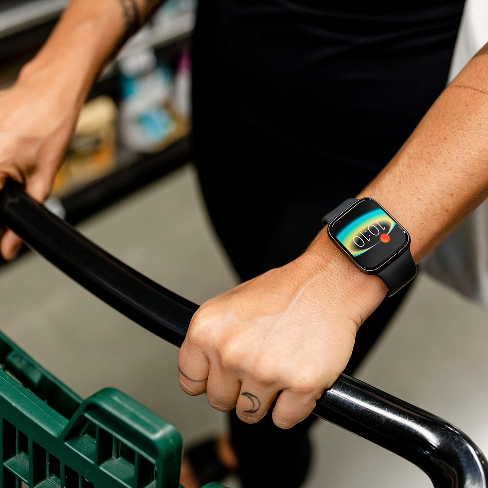 Man wearing smartwatch, fitness tracker photo