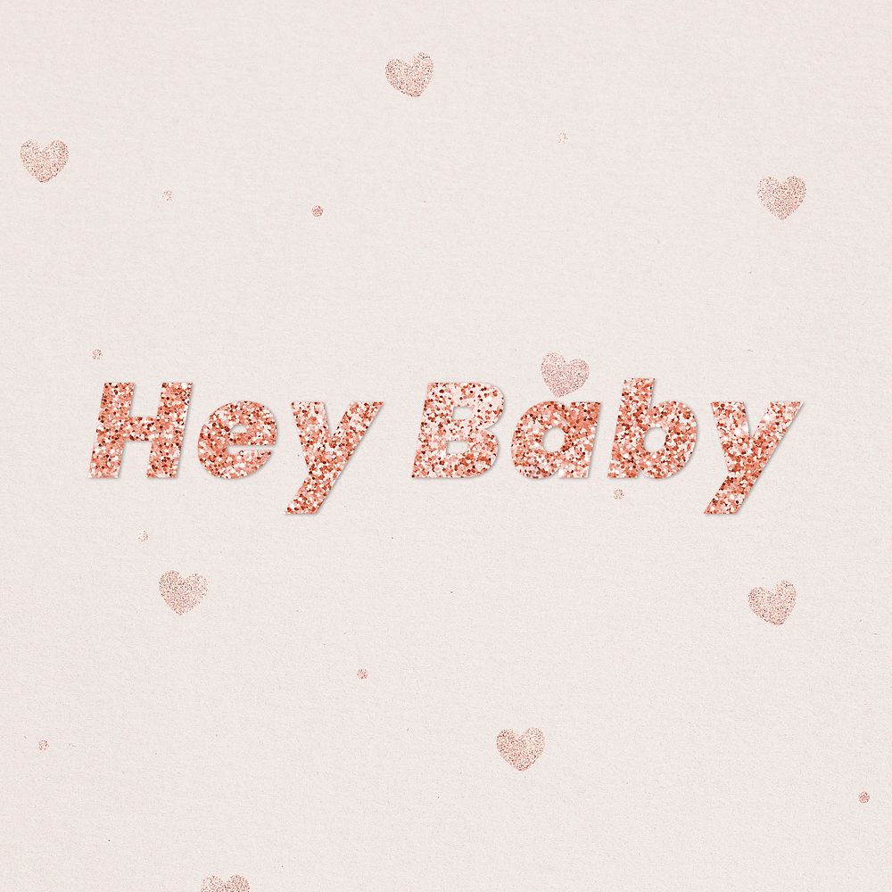 Glittery hey baby typography on heart patterned background