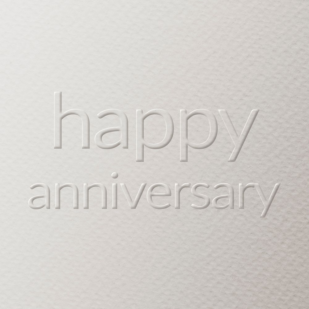 Happy anniversary embossed text white paper background