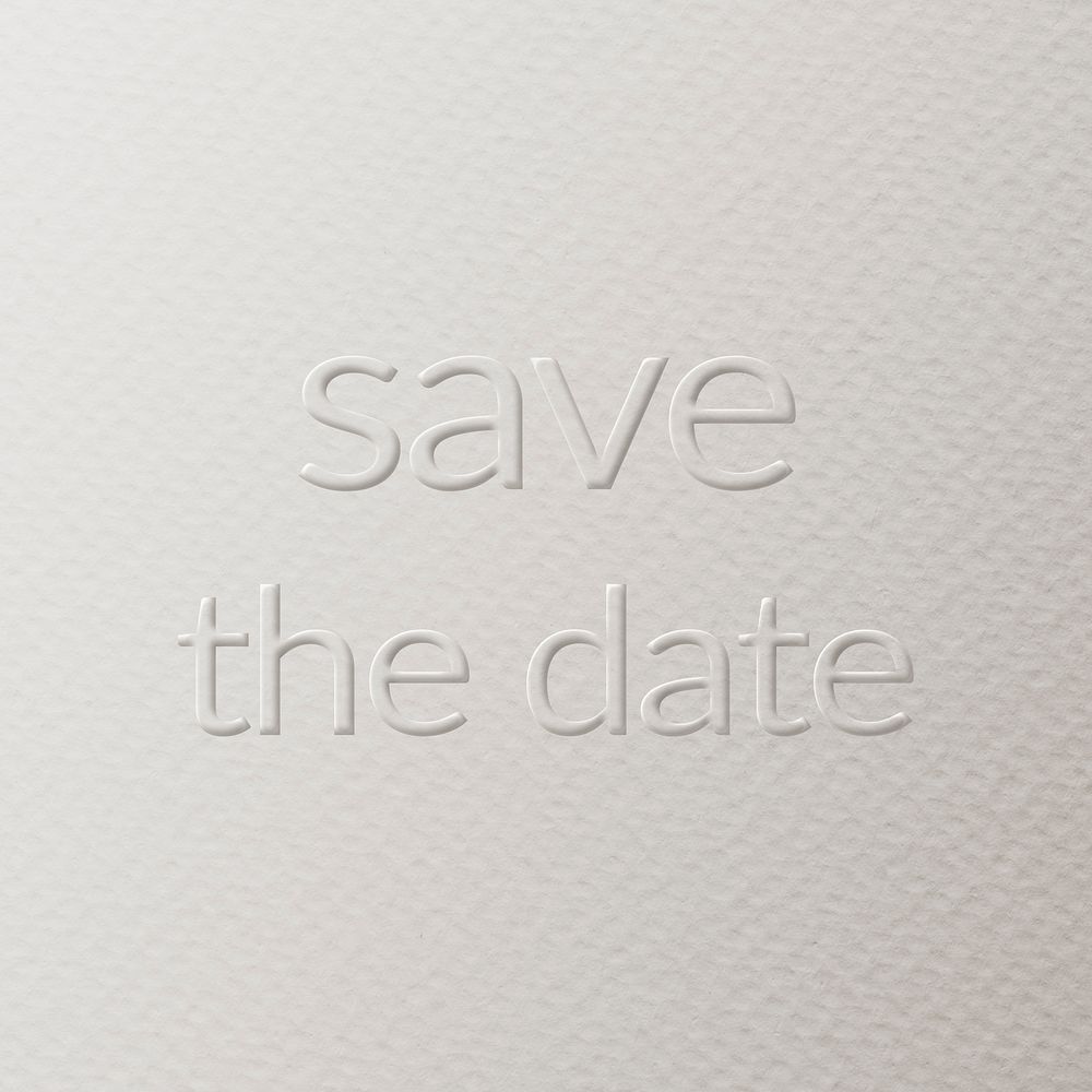 Save the date embossed text white paper background