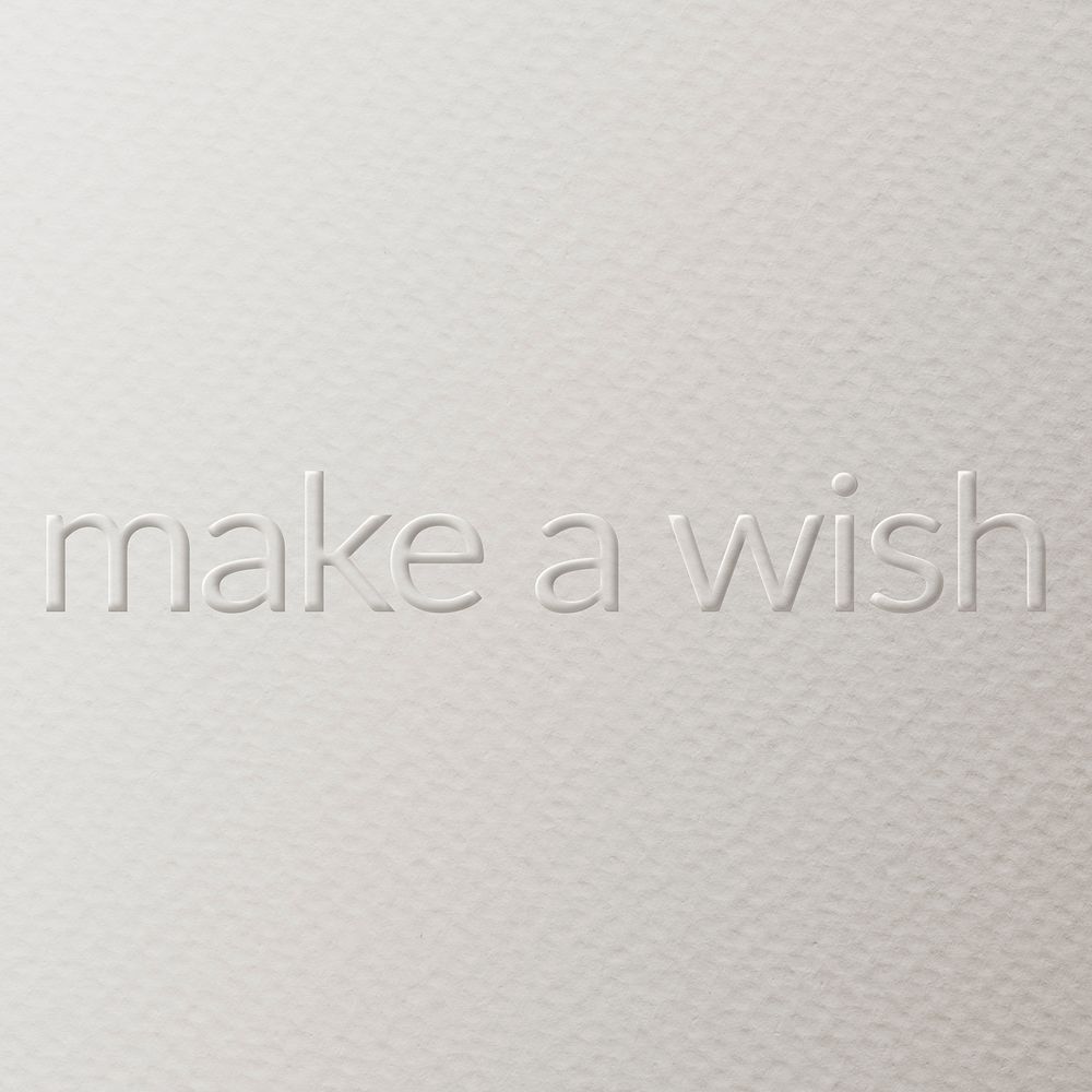 Make a wish embossed text white paper background
