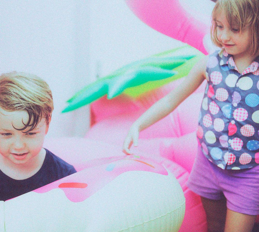 Children playing on bouncy castle