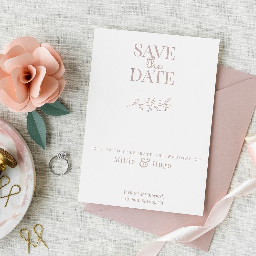 Wedding card template mockup with a diamond ring and a pink rose