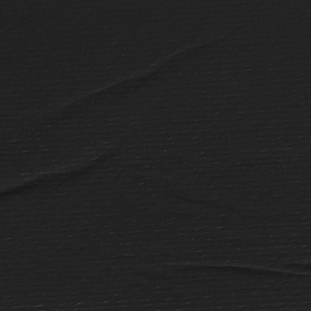 Black background, wrinkled paper texture
