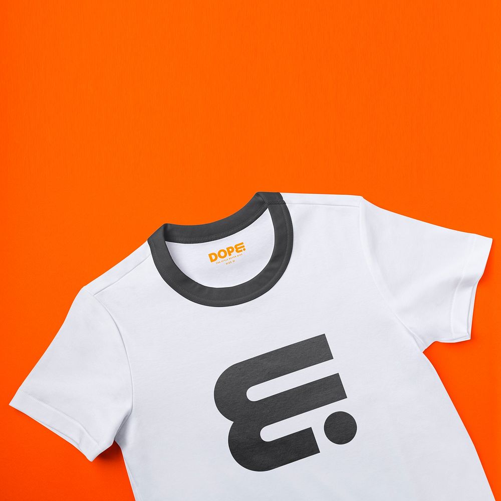 White t-shirt, abstract geometric logo on orange background