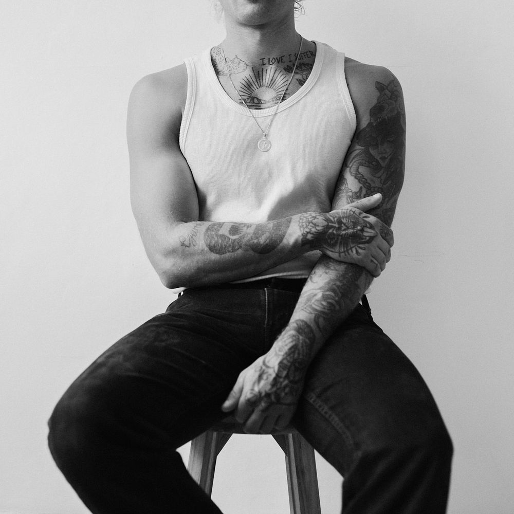 Tattooed man, men's fashion, gray photo