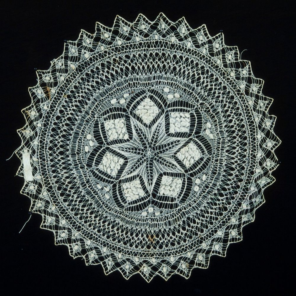 Round doily of knitting. Original from the Minneapolis Institute of Art.
