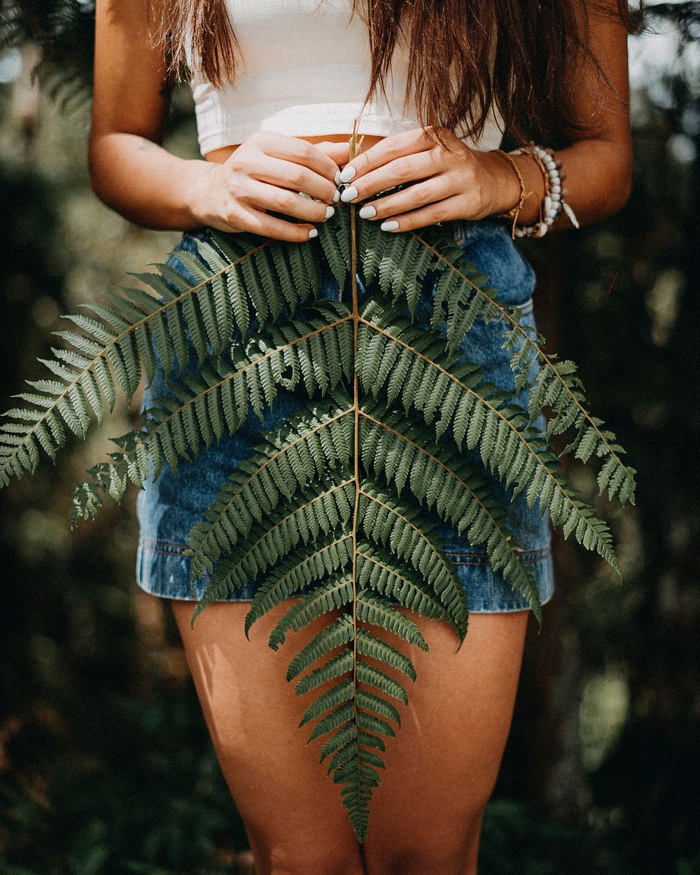 Woman with leaf, nature travel. Free public domain CC0 photo.