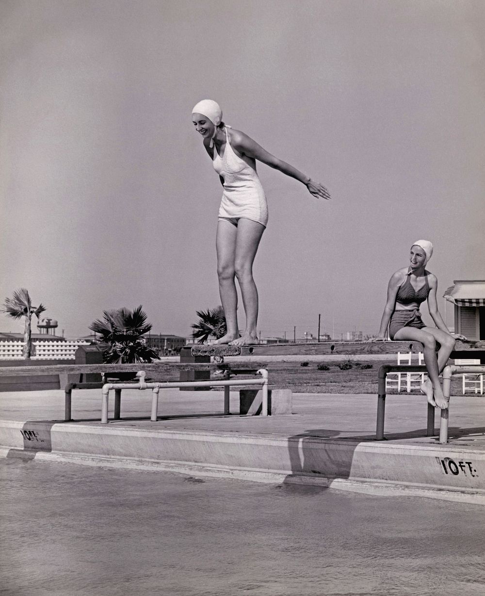 Women on diving board at swimming pool, vintage black and white photo, remix composite image.
