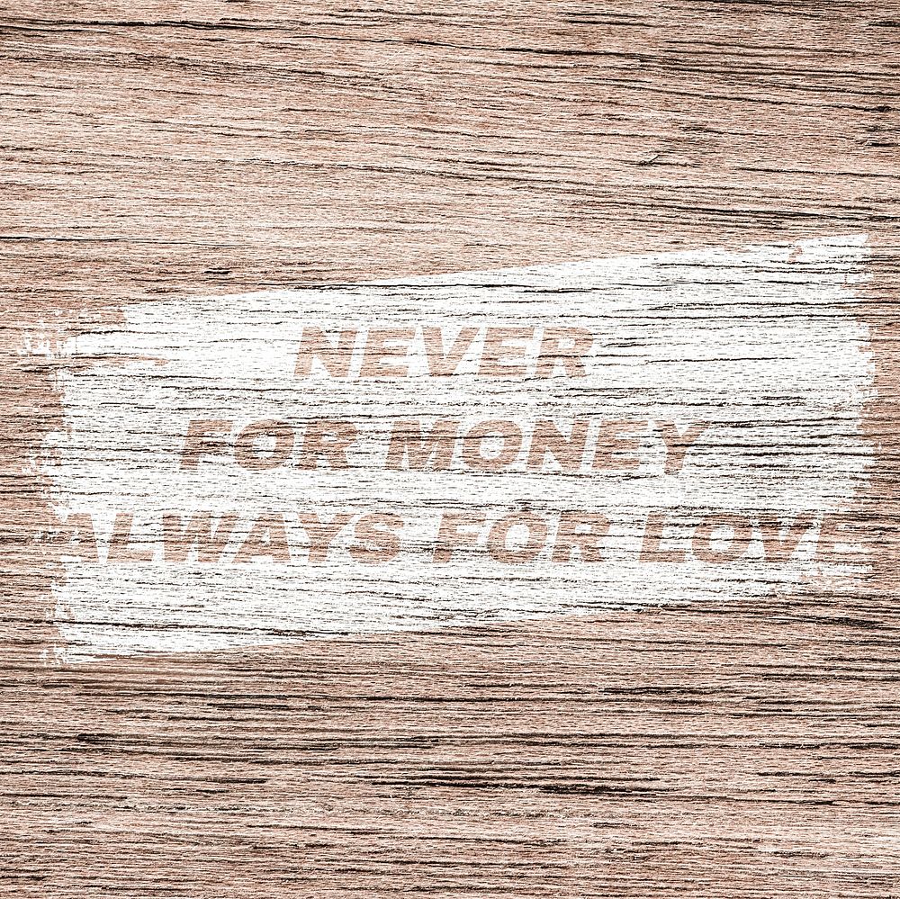 Inspirational printed quote Never for money always for love on brown wood
