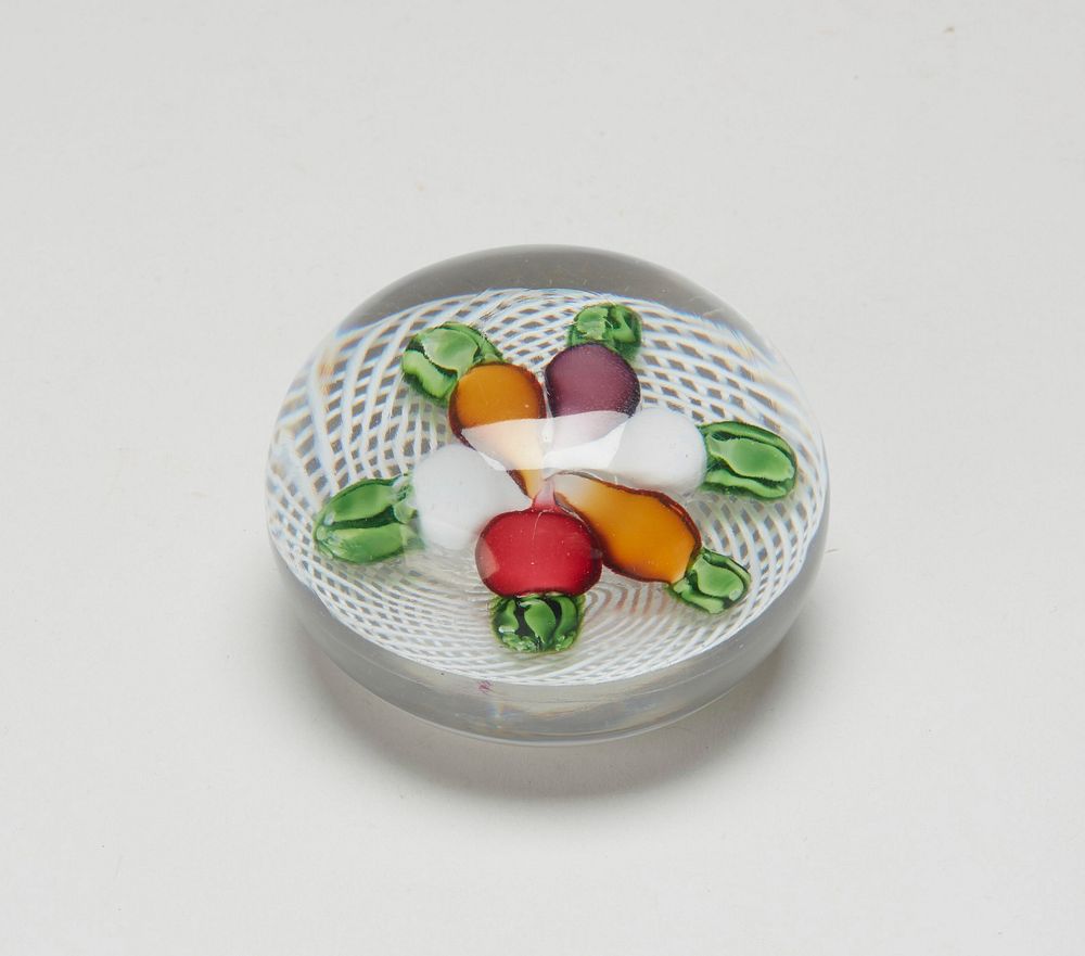 medium size paperweight consisting of six vegetables, two white and one red radish, two yellow carrots (!) and one purple;…