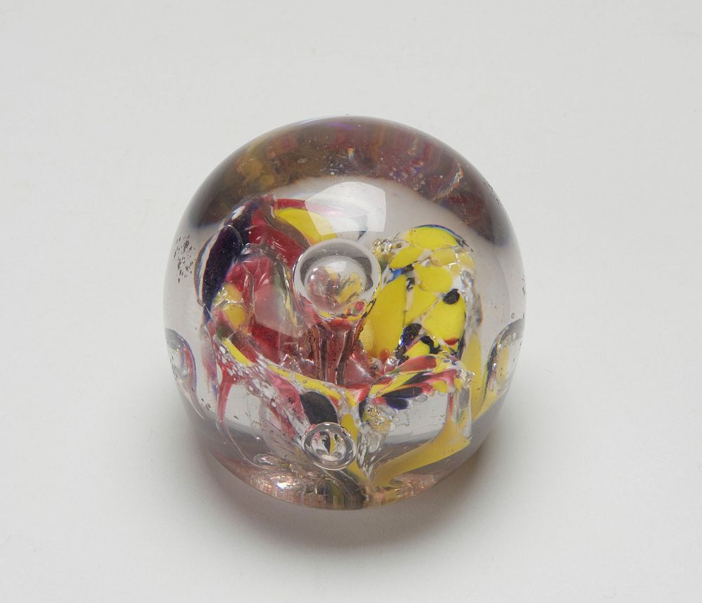 large 4-petaled flower, vari-colored, mostly yellow, silver bubble center. Original from the Minneapolis Institute of Art.