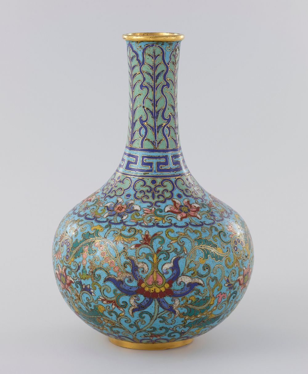 cloisonné bottle; rounded bottom section on gold ring foot; shoulder tapers to long spout which slightly flares outward at…