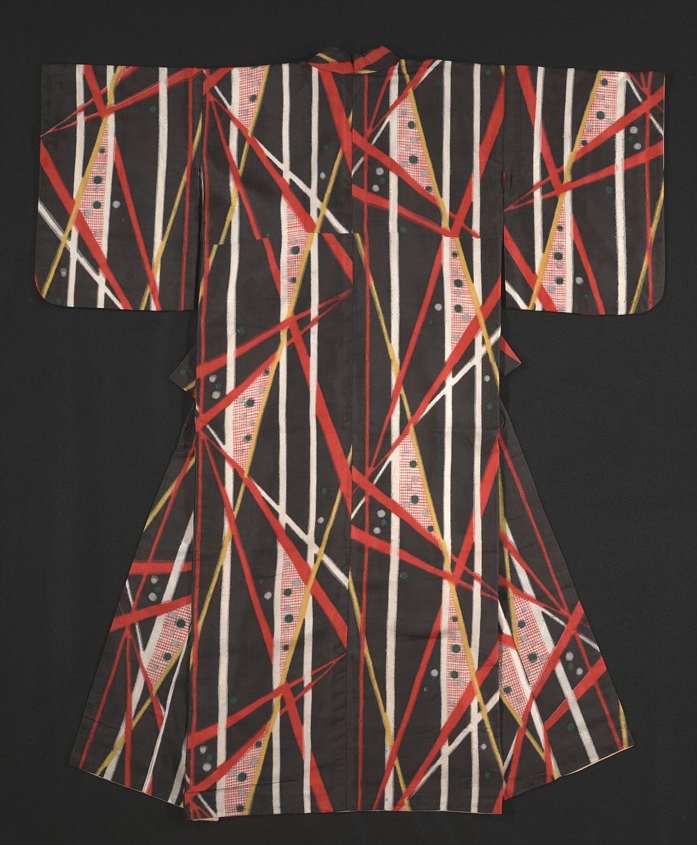 Black kimono with red, white and yellow vertical and diagonal lines with some green and gray dots; some vertical pattern…