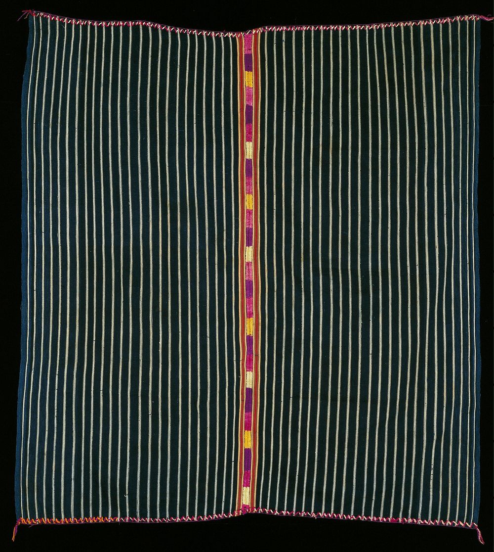 blue/white warp-faced cotton stripe with silk embroidered band vertically through center (purple, yellow, pink). Original…