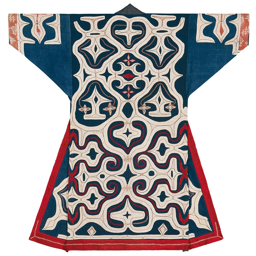 Blue robe with abstract motif in white applique on entire back, shoulders, and sleeve cuffs; contrasting, decorative…