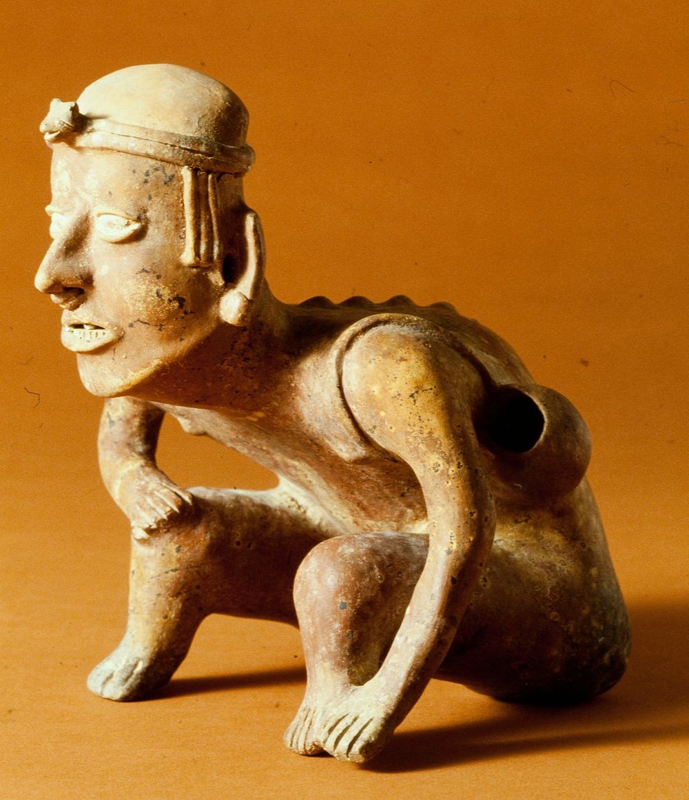 seated male, clay, pigments, West Mexican (Colima), 200 - 700 AD. Figure makes noise when figure is turned over.. Original…