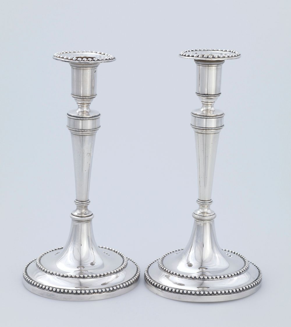 candlestick, one of a pair, plain, tapered, with beaded borders and detachable nozzles. Original from the Minneapolis…