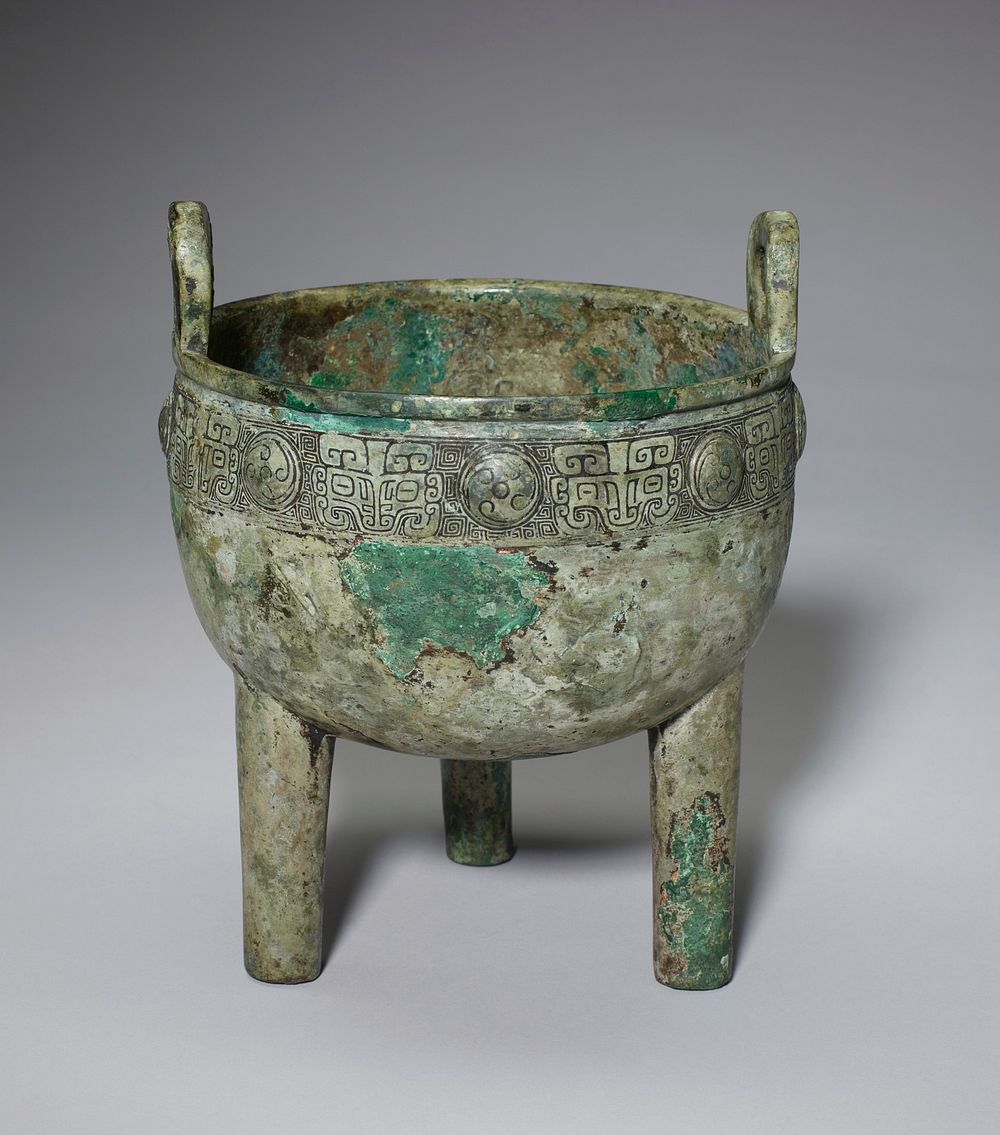 bowl with loop handles on three legs; band of t'ao-t'ieh masks and medallions surrounding rim. Original from the Minneapolis…