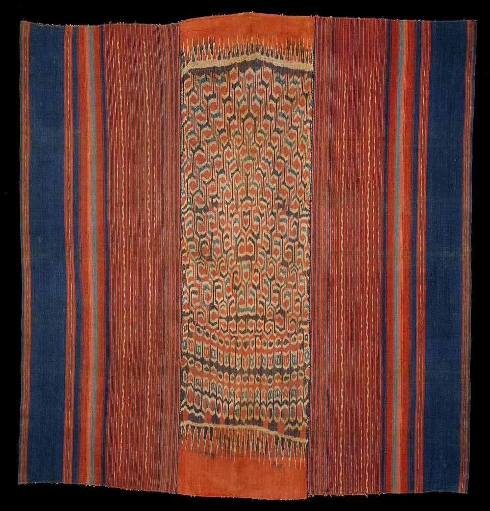 3 panels hand stitched together; ikat vertical stripes in rust, cream, indigo. Original from the Minneapolis Institute of…