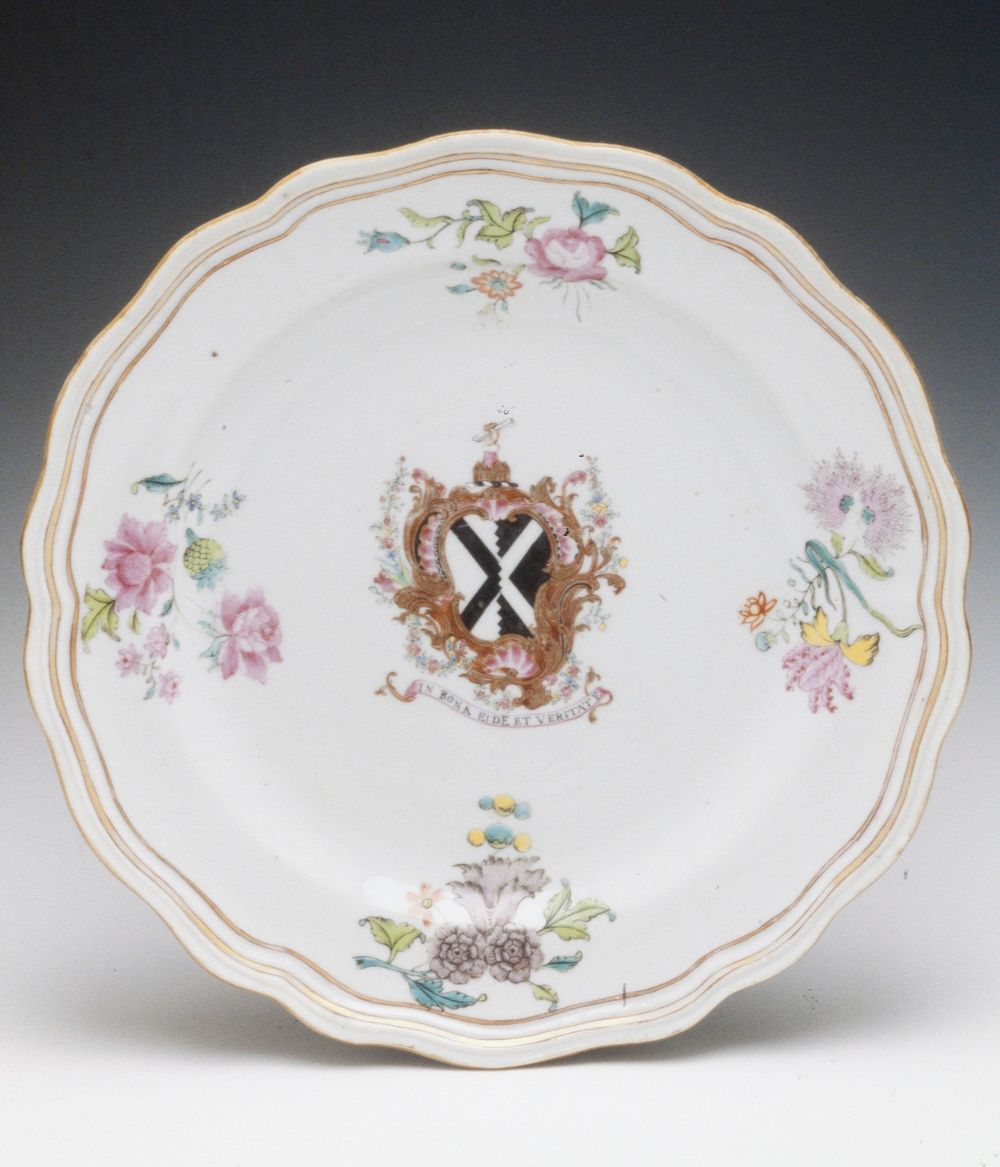 white glaze, centerfield with Coat of Arms of Scott, motto 'in Bona Eide et Veritate', border with floral sprays in colors…