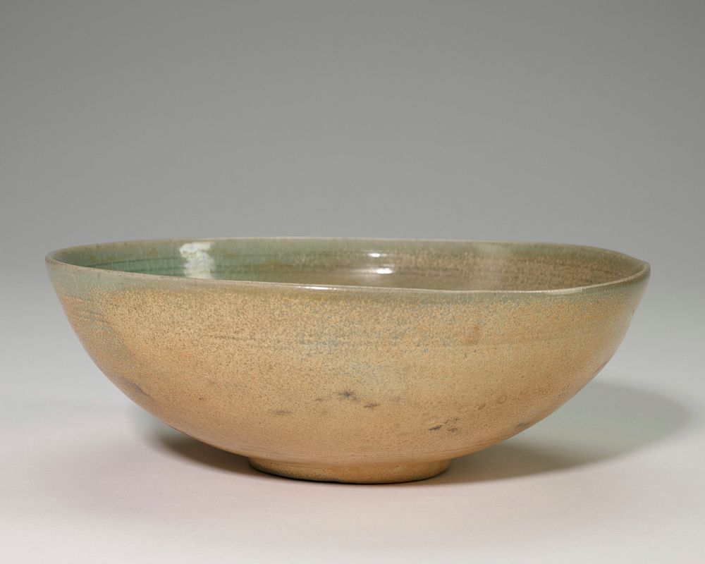 Bowl, shallow buff color outside and gray green glaze inside three incised lines near rim.. Original from the Minneapolis…