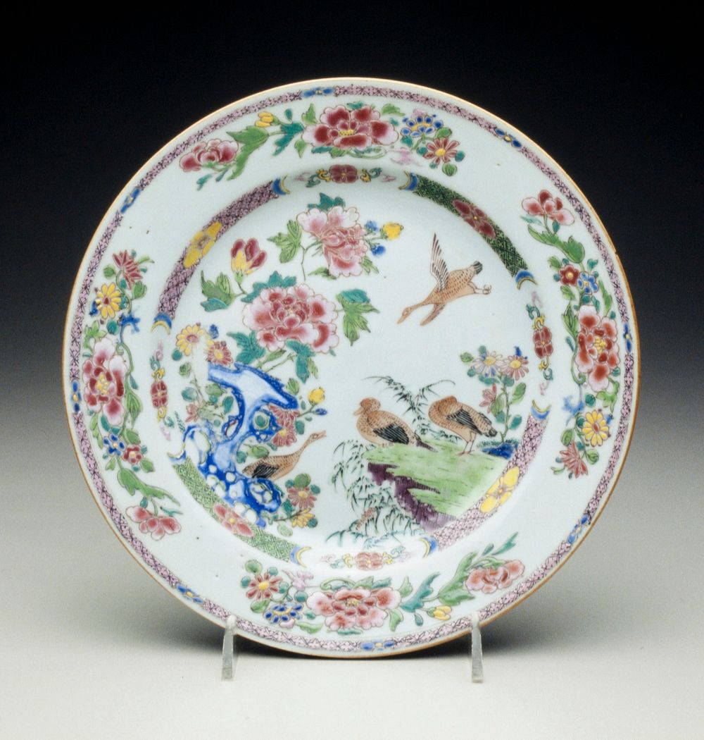porcelain famille rose plate pair of ducks and two geese in flight, birds standing on rockwork, border with peony and…