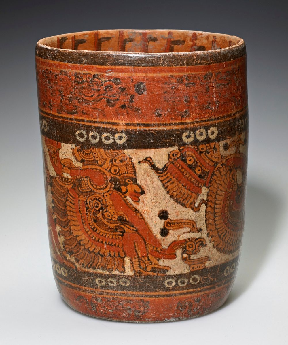 Vessel with figure band painted around the outside and interior is painted as well. Red, brown and orange throughout..…