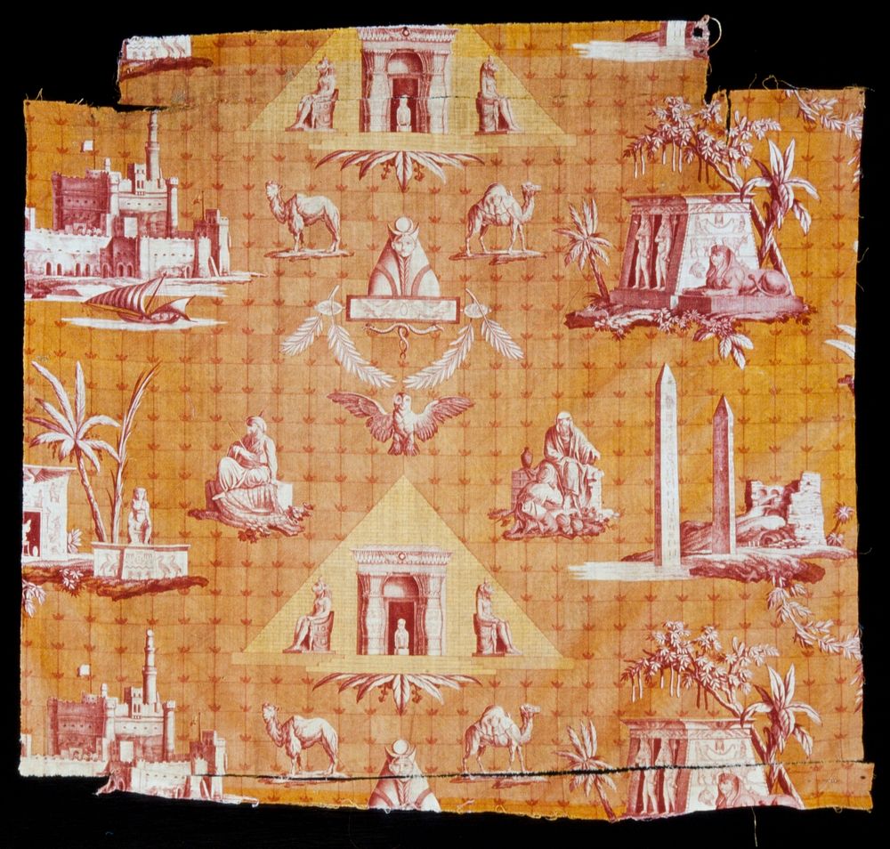 Toile, piece of in SCENES OF EGYPT pattern. Polychrome printing with orange and rust predominating. Torn at upper edge.…