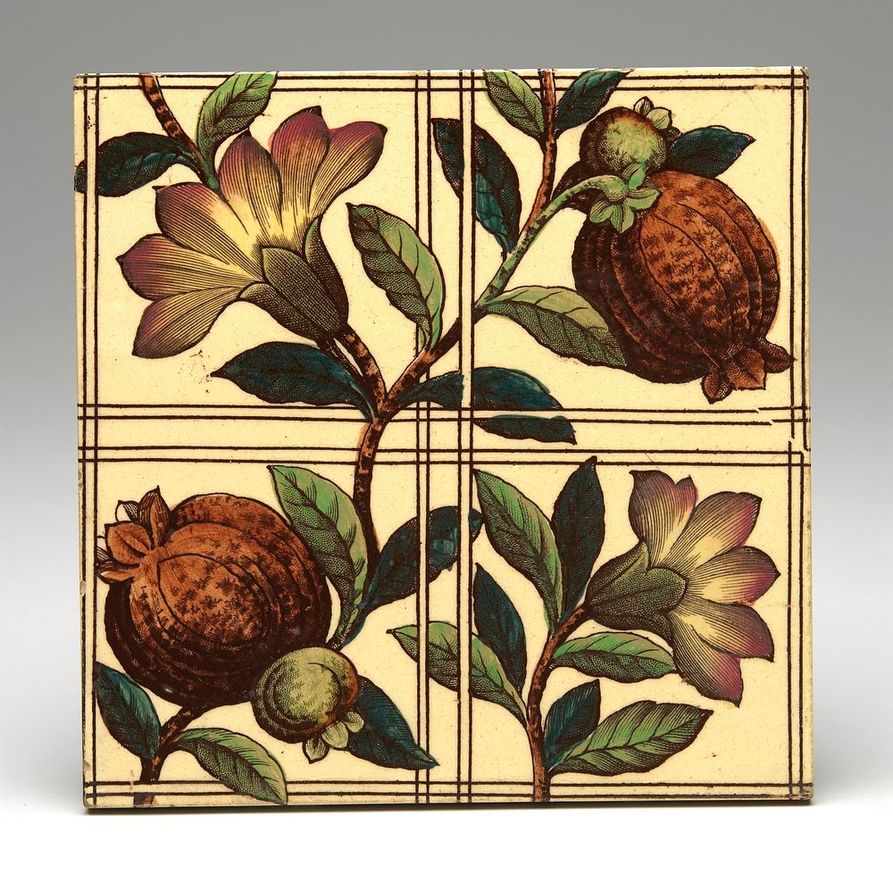 one branch with 2 pomegranates and flower, another branch with flower in one corner; grid design; multicolored transfer…