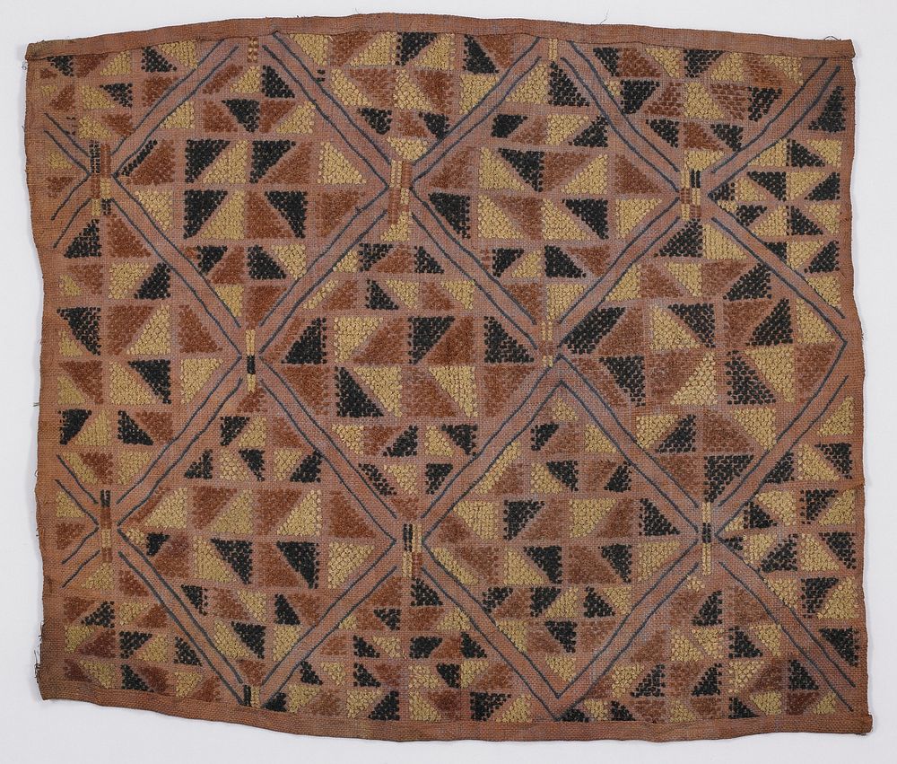 pinkish ground with triangles in tans and brown, diagonal lines in grey. Original from the Minneapolis Institute of Art.