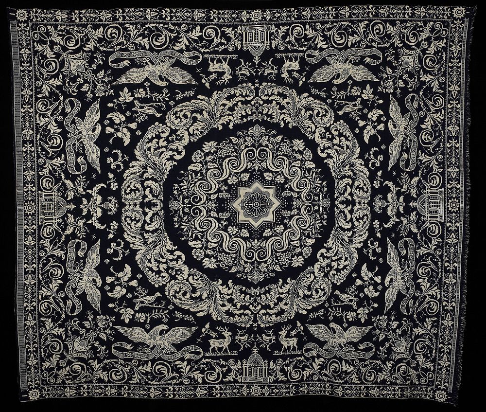 jacquard woven; blue and white; central medallion surrounded by foliage and curvalinear forms; deer, birds in trees, eagles…