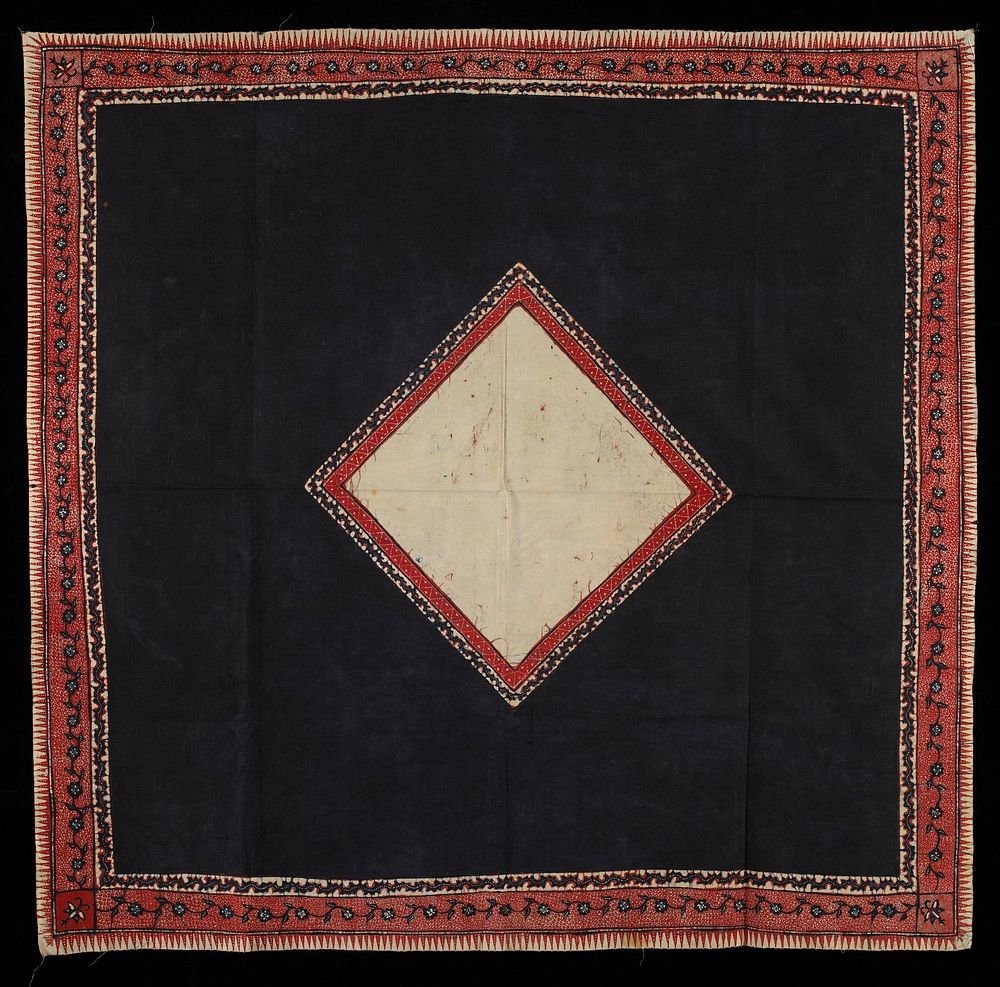 blue and red on cream; cream square in center with 2 borders, surrounded by blue field; 3 borders at edge: 2 organic, 1…