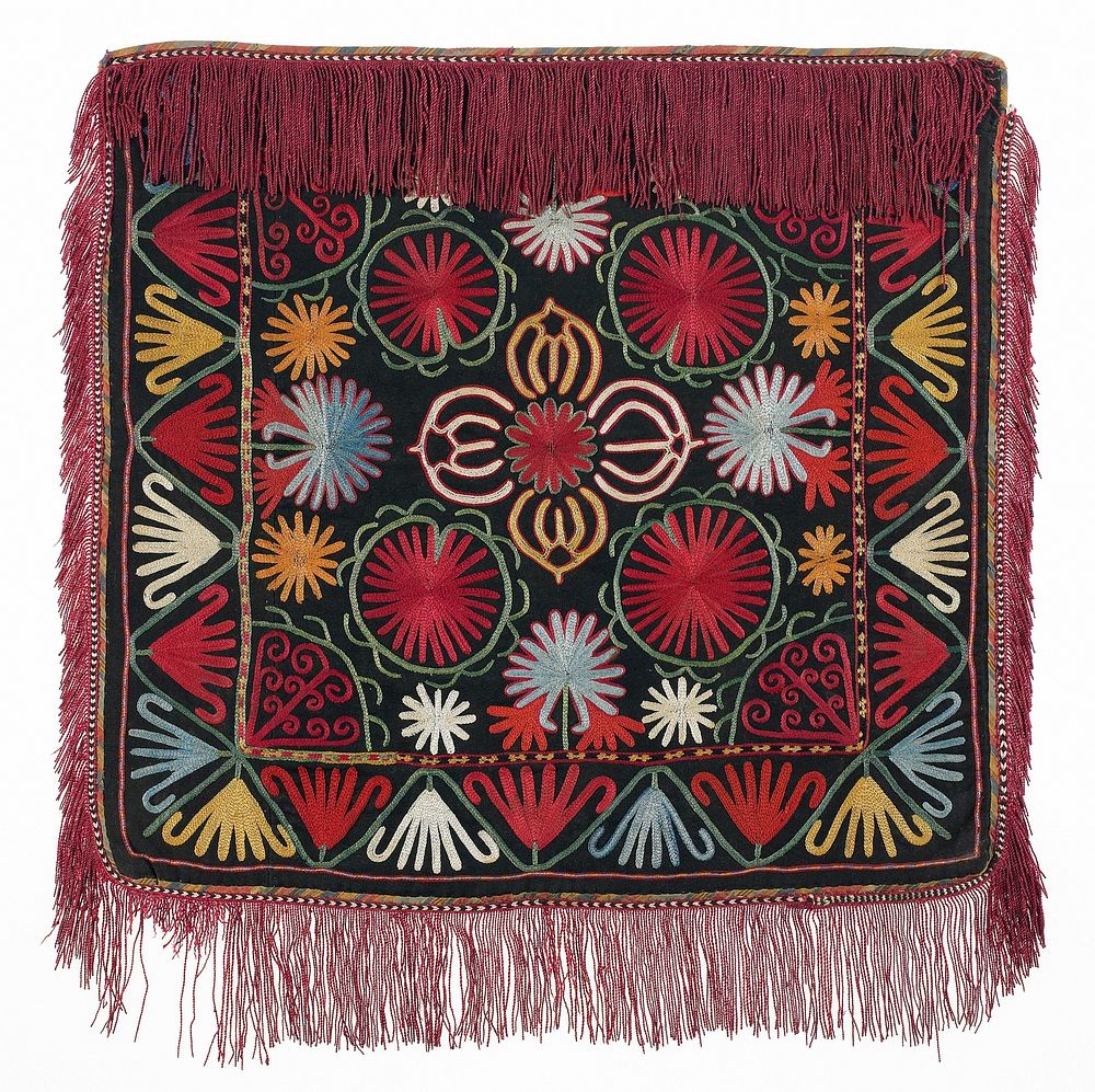 Pieced fringe with warp-twined (tablet) heading and cloth band Pieced, block-printed lining. Pieced, black wool ground with…