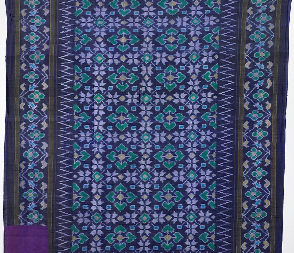 weft ikat; purple with green, yellow and blue geometric patterns. Original from the Minneapolis Institute of Art.