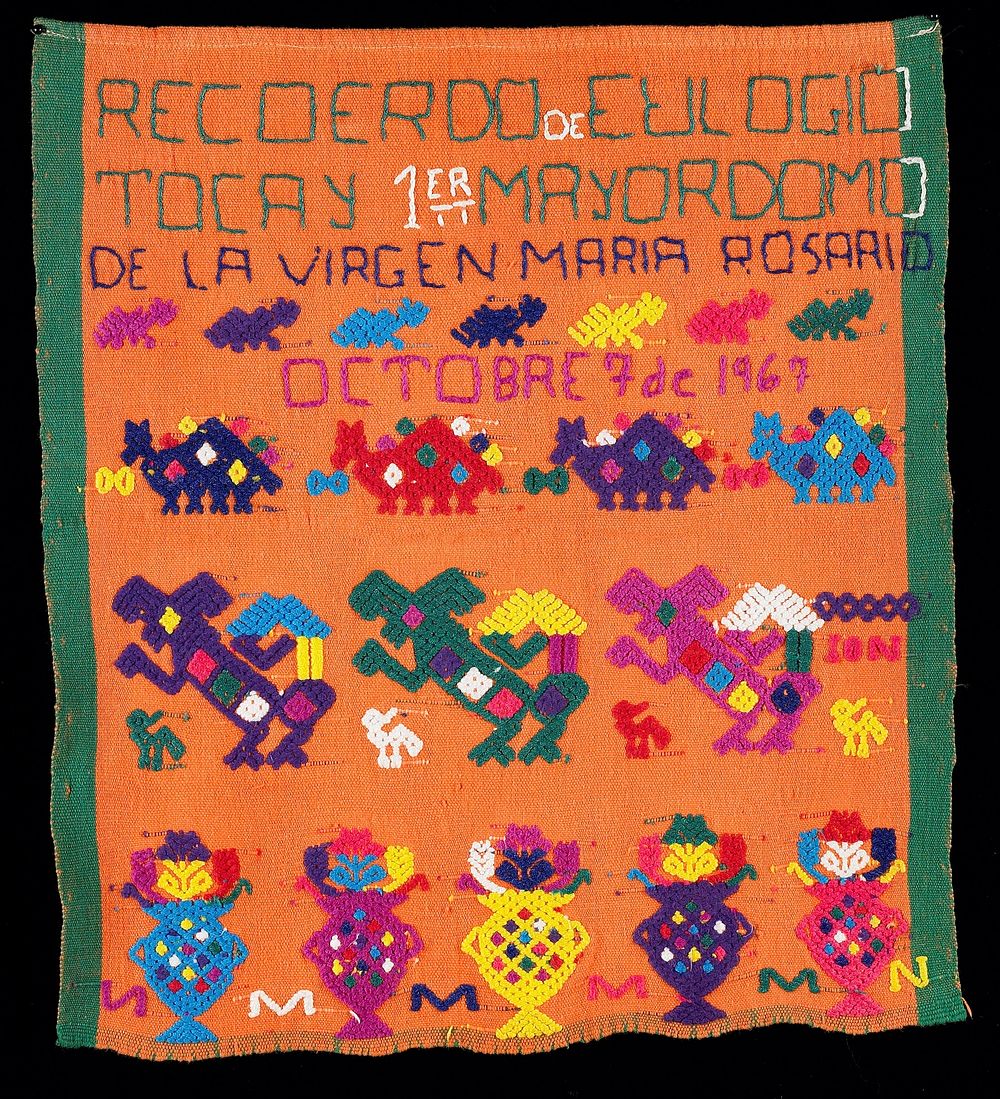 orange cotton ceremonial "banner"; inscription reads, "Recoerdo de Eulogio Tocay 1er Mayordomo de la Virgen Mario Rosario…
