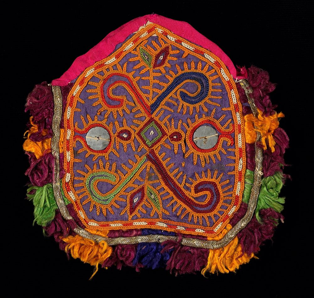 orange, purple; small; two shi-sha mirrors decorate "X" chain stitch design; outlined in metal braid and multicolored silk…