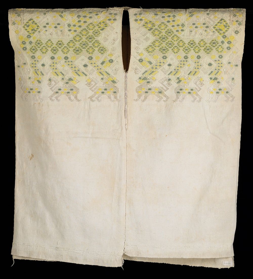 coarse woven white cotton; top, front and back have supplementary weft silk designs including animals; some areas are…