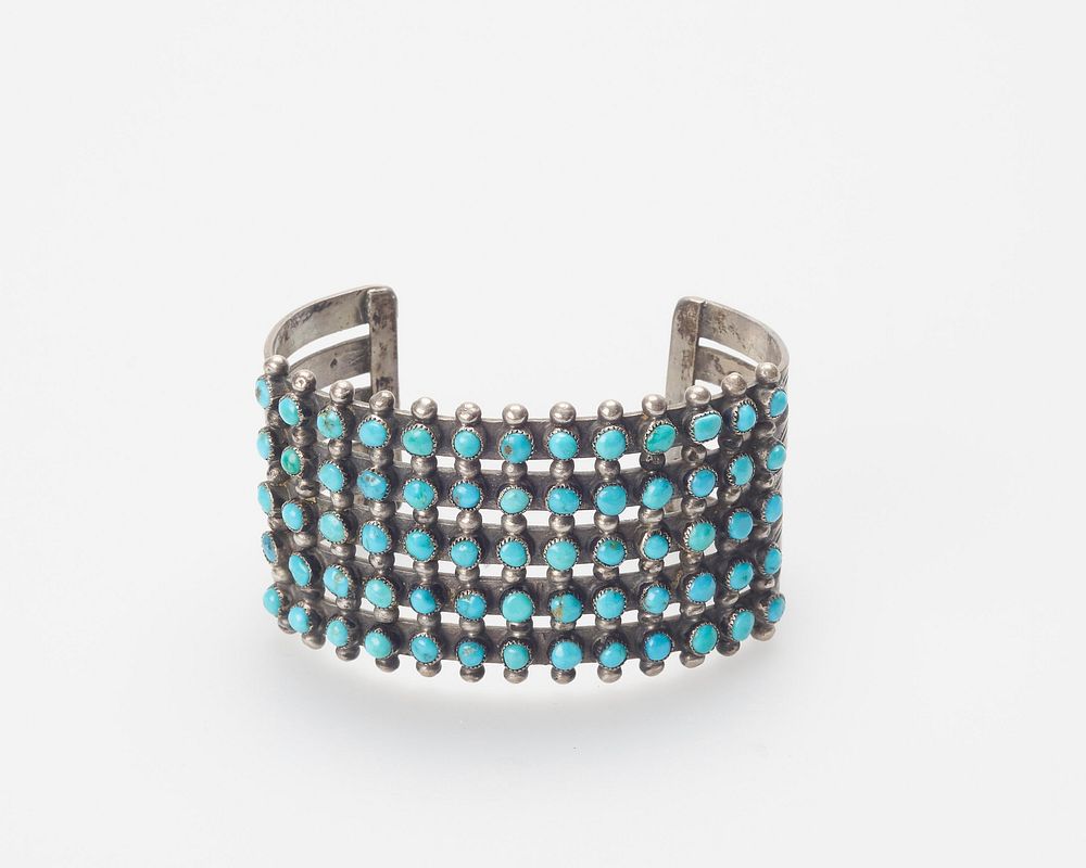 5 bands, silver drops and 65 turquoise in rows. Original from the Minneapolis Institute of Art.