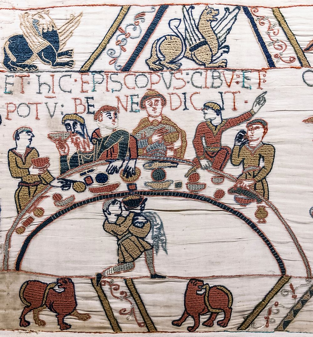 Bayeux Tapestry - Scene 43: Bishop Odo blesses the first banquet that Duke William and the Norman Barons hold on English…