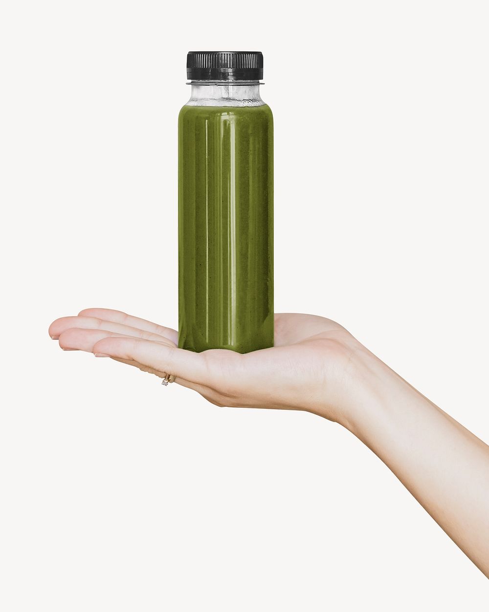 Celery juice bottle in hand