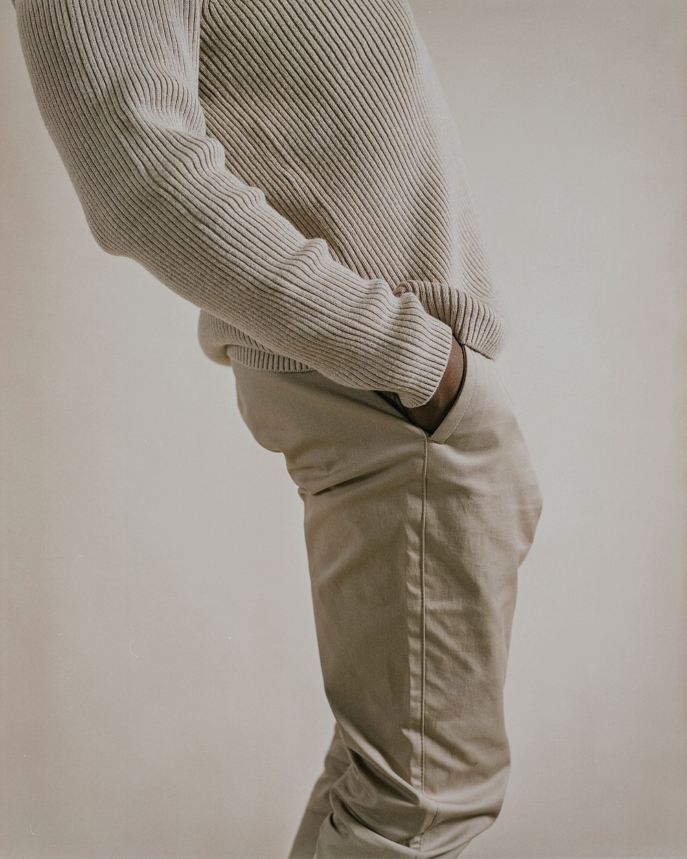 Men's beige pants, wool sweater, retro film photo