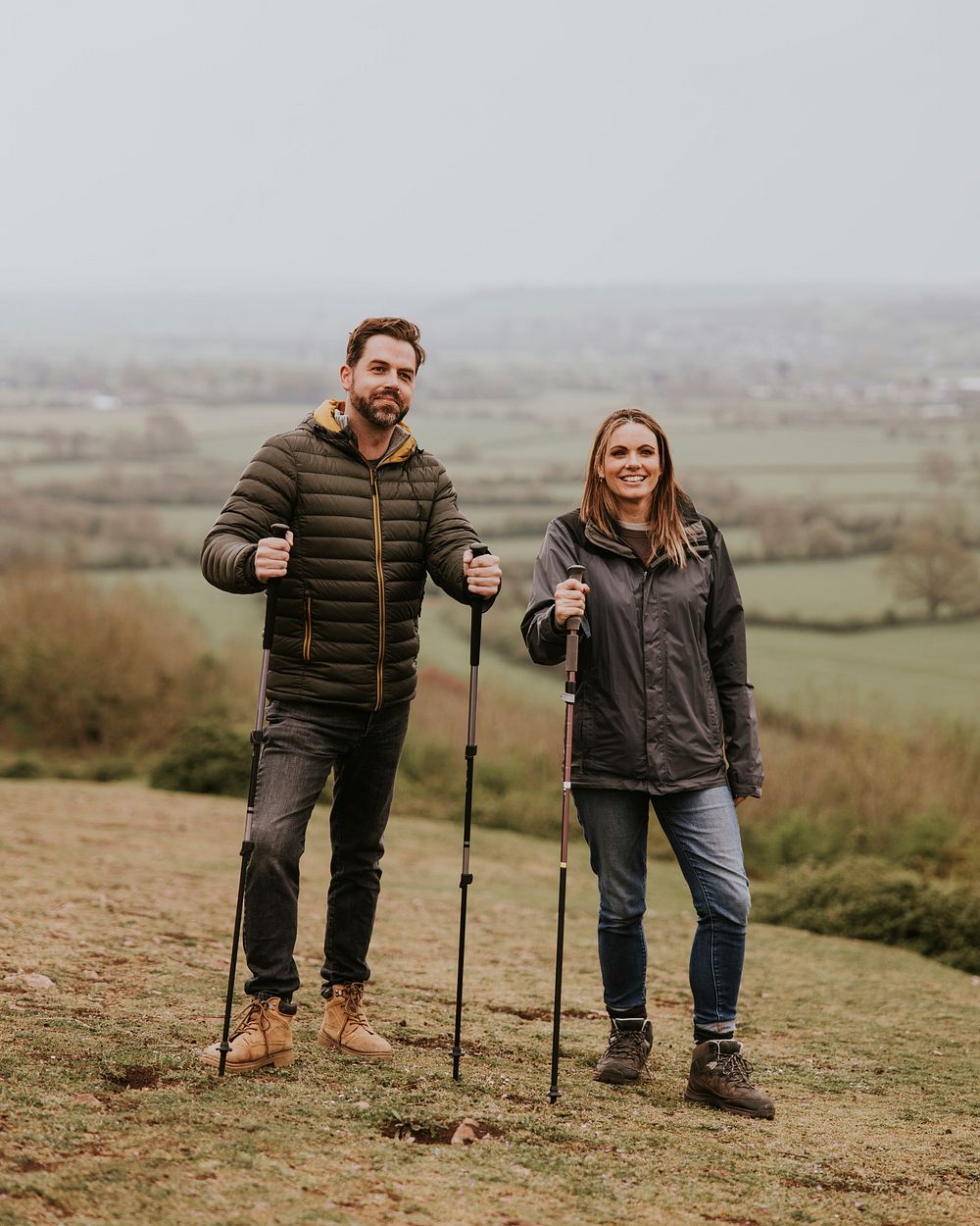 Couple trekking on mountain together