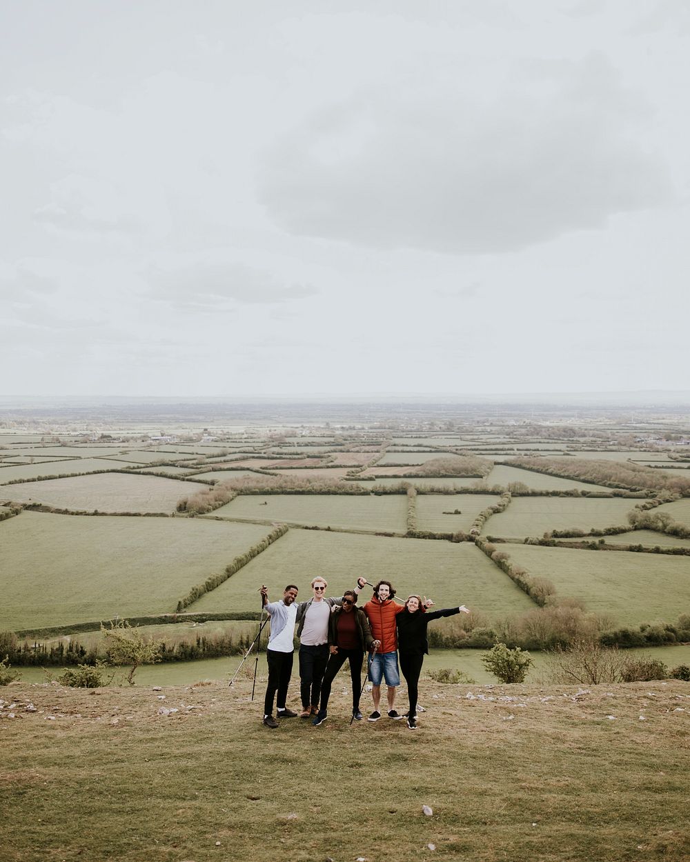 Friends hiking on hill, outdoor activity