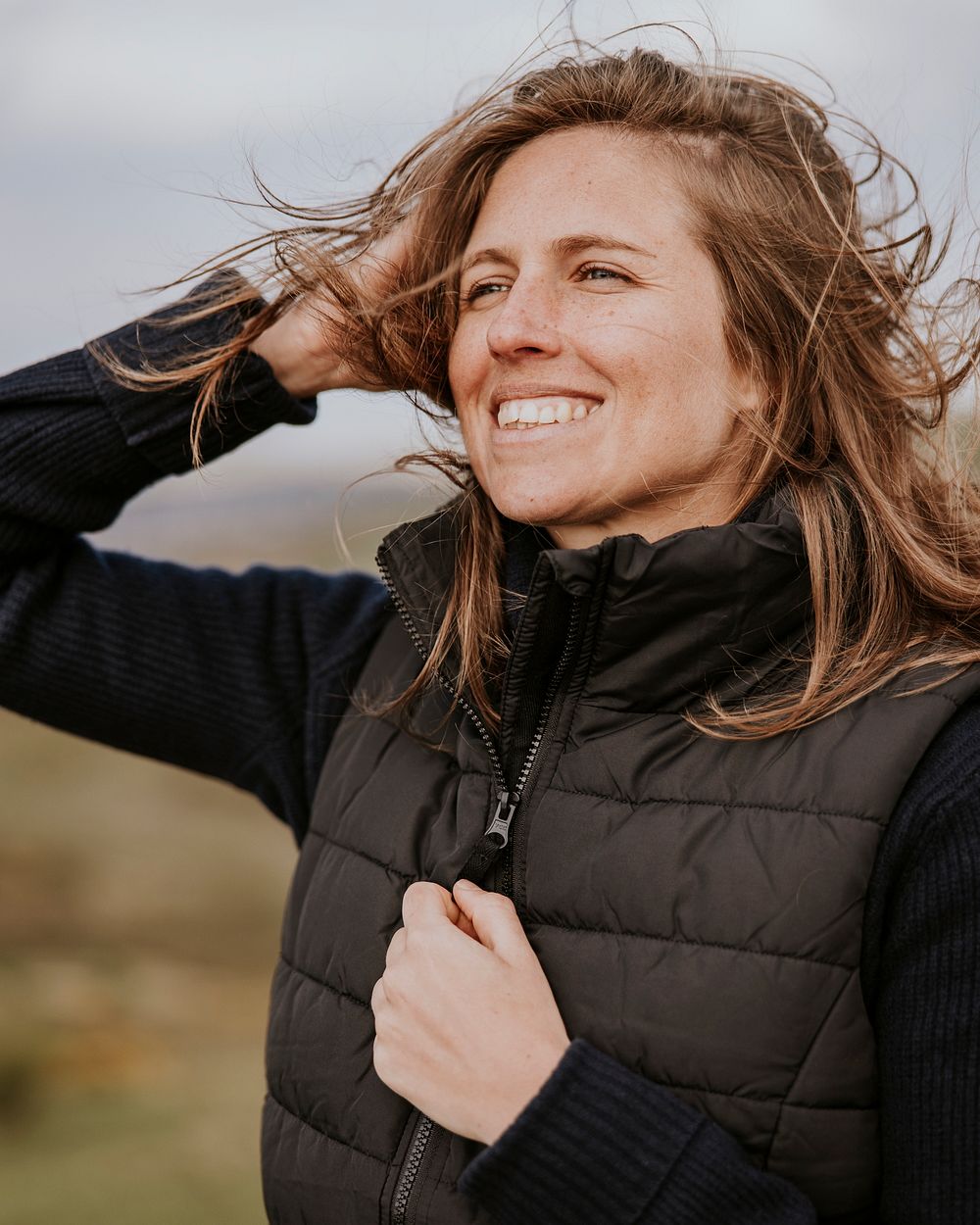 Smiling woman wearing black jacket photo