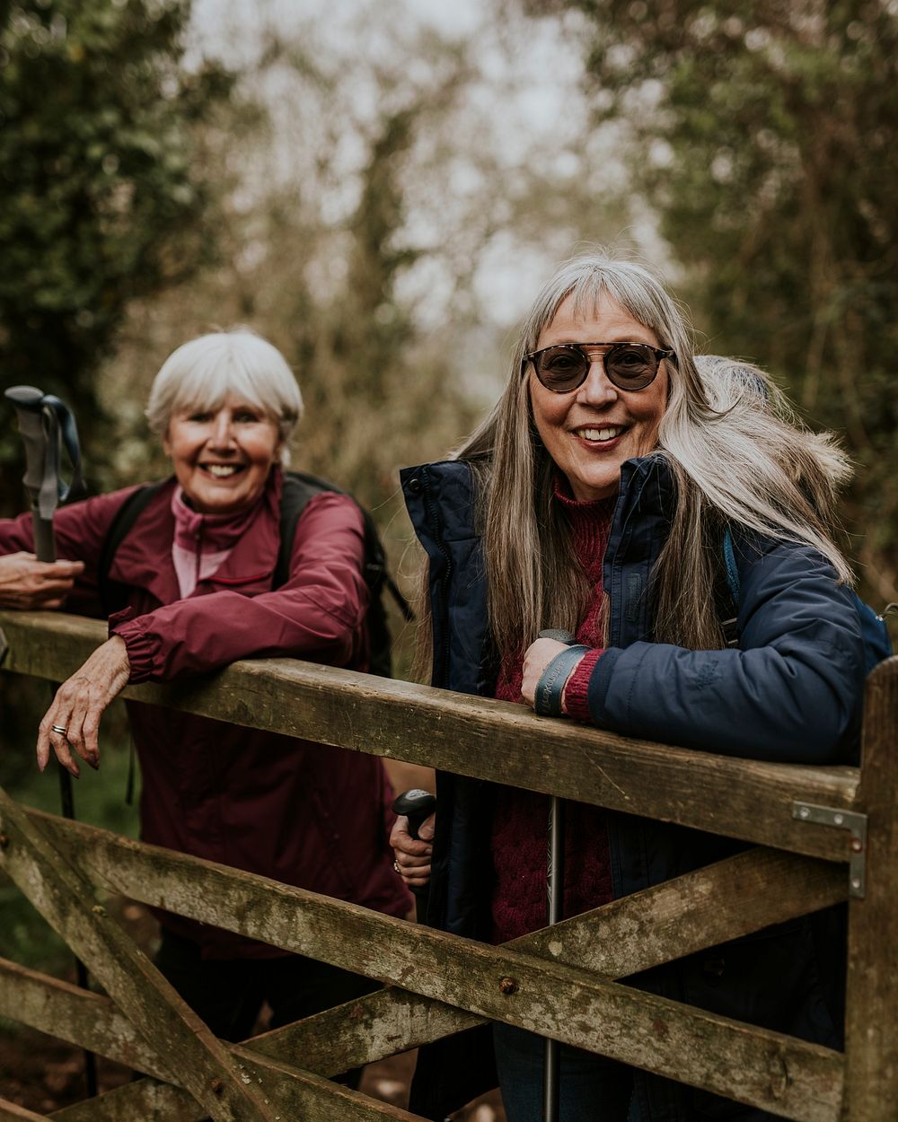 Senior women trekkers, countryside, outdoor travel