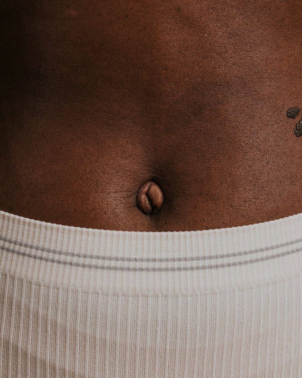 African woman's belly button closeup photo