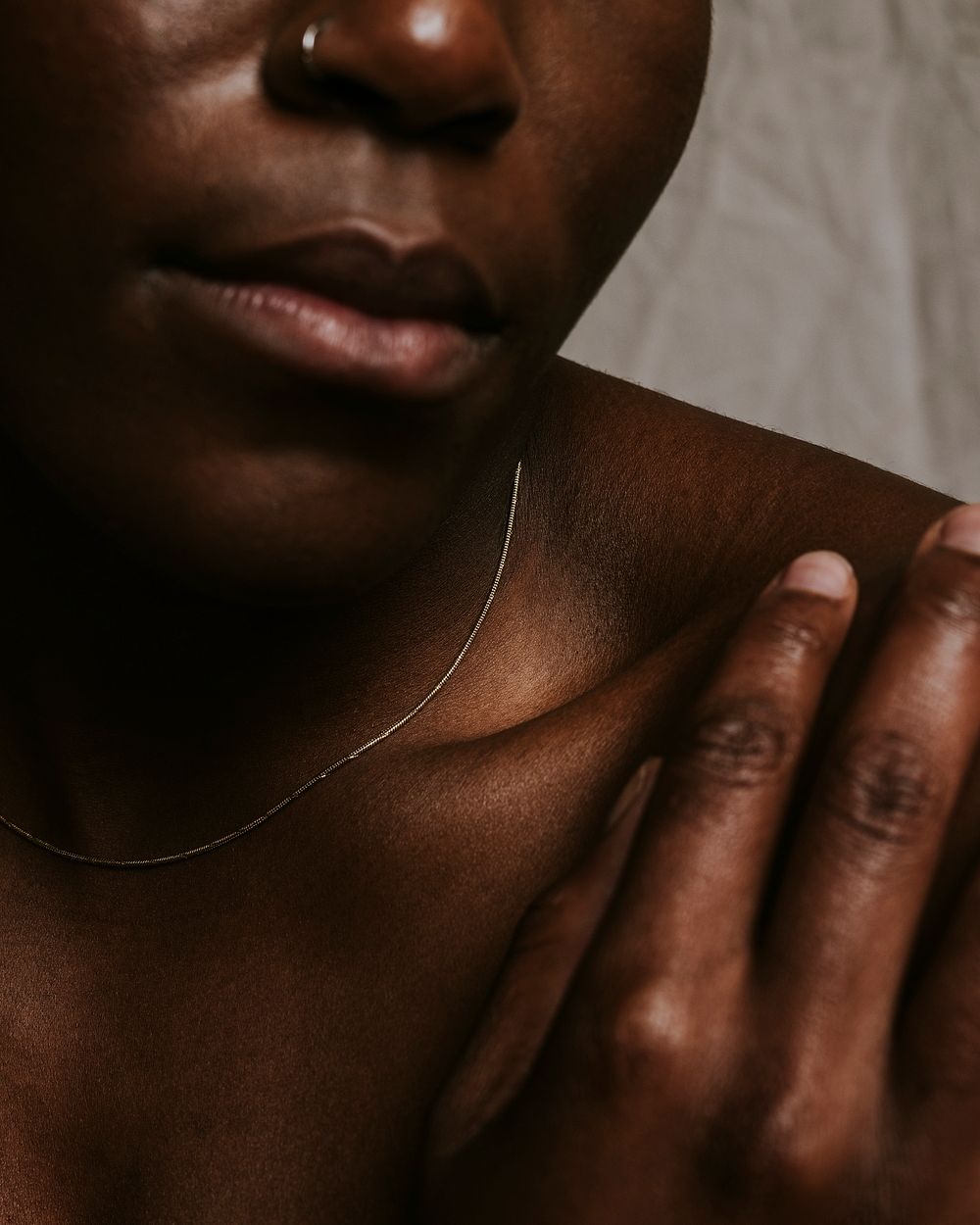 African woman, bare shoulders closeup photo